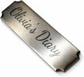 Personalized stainless steel name tags, adhesive back.