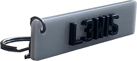 Personalised car number plate keyring with custom name or registration.